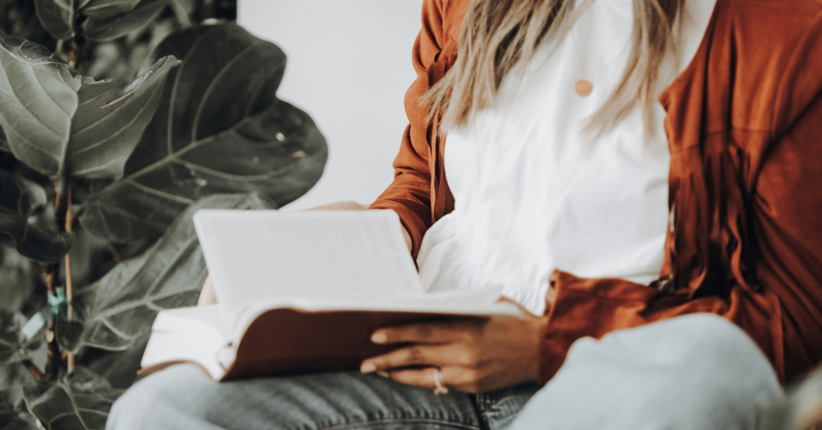 woman holding a Bible