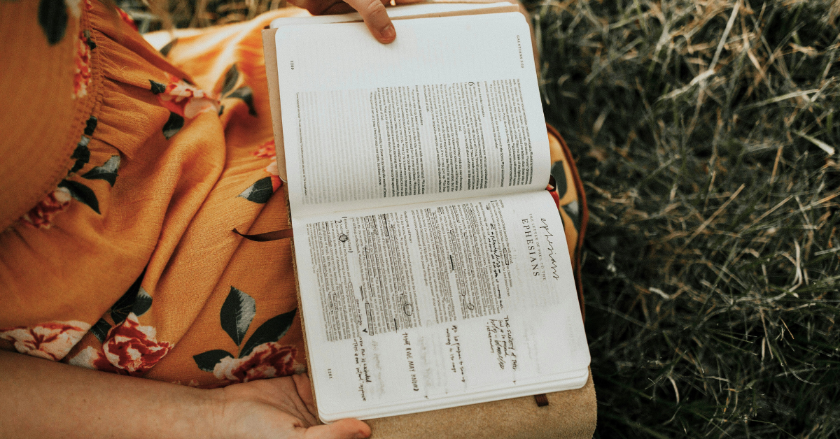 woman with a Bible in her lap